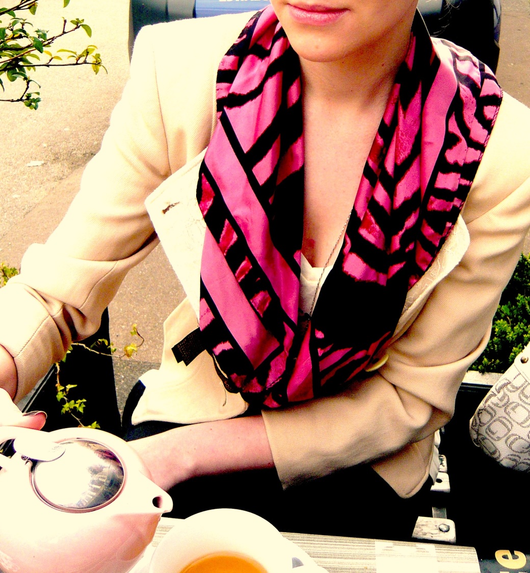 pouring tea in cavalli scarf dior jacket